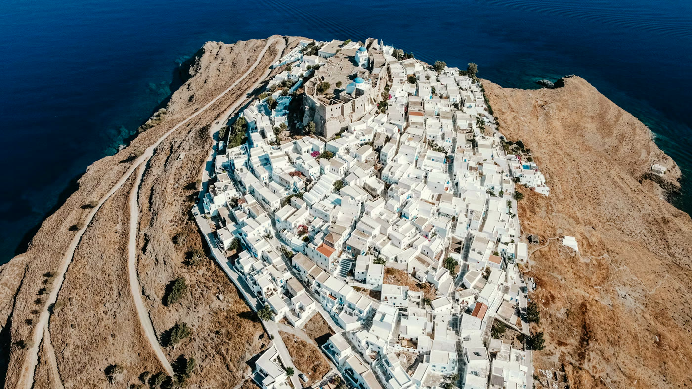 Aerial view of the whitewashed Chora of Astypalaia above the Aegean sea